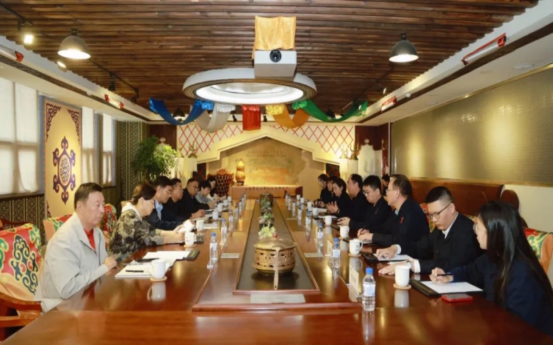 津南区关工委主任杨令生一行到旋乐吧spin8集团调研座谈